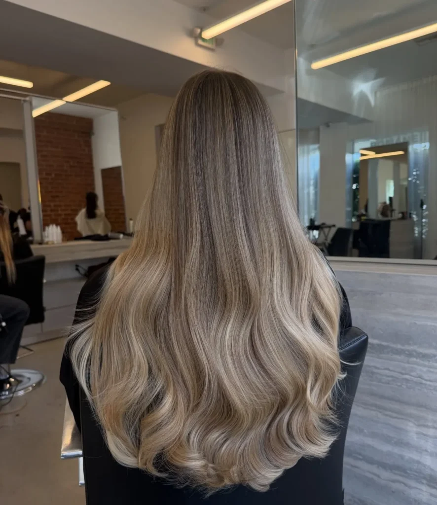 Ash Blonde Balayage with Sleek Straight to Wavy Finish