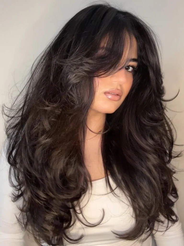 Black Brown Long Layers with Curtain Bangs and Wild Curls
