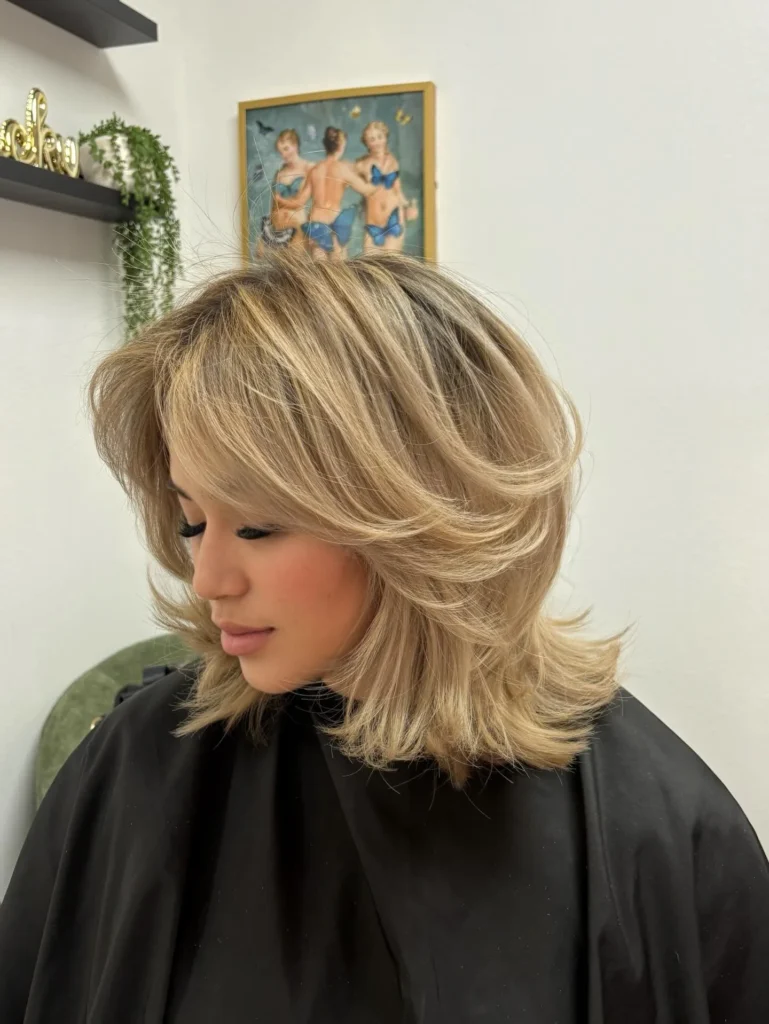 Blonde Feathered Bob with Voluminous Layers