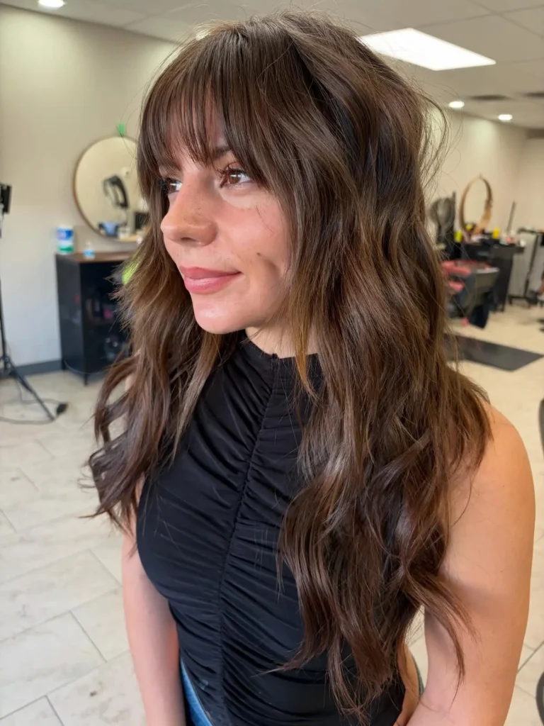 Long Brunette Shag with Micro Bangs and Beachy Waves
