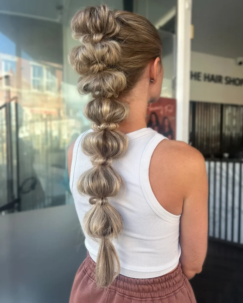 Long Bubble Braid Ponytail with Blonde Highlights