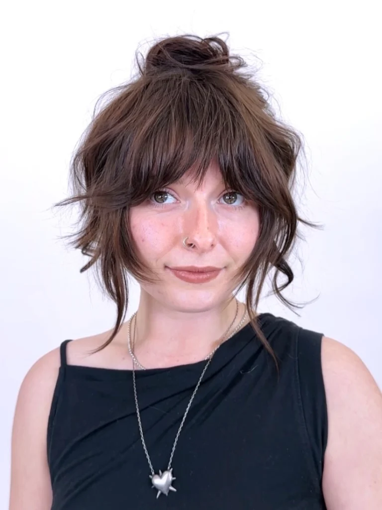 Messy Brown Shag with Side-Swept Fringe