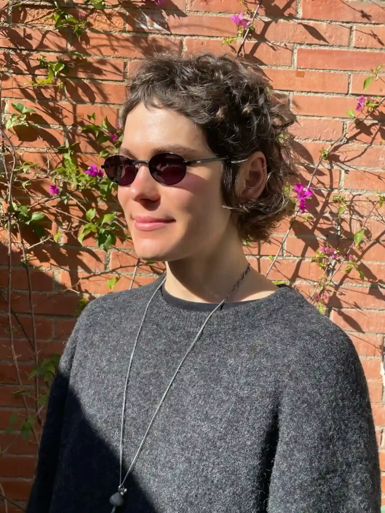 Salt and Pepper Curly Bixie with Natural Gray Blending