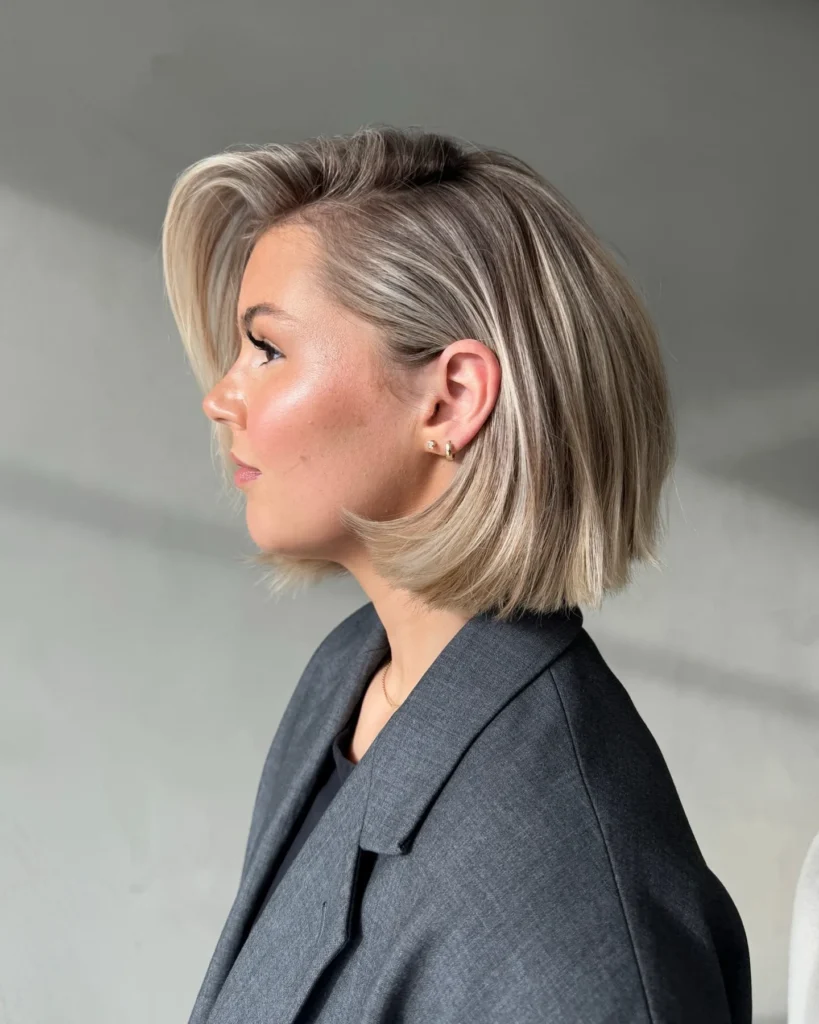 Sleek Ash Blonde Blunt Bob with Slicked-Back Crown