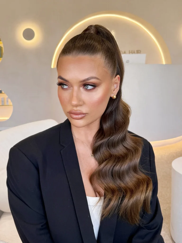 Sleek High Ponytail with Side Swept Waves