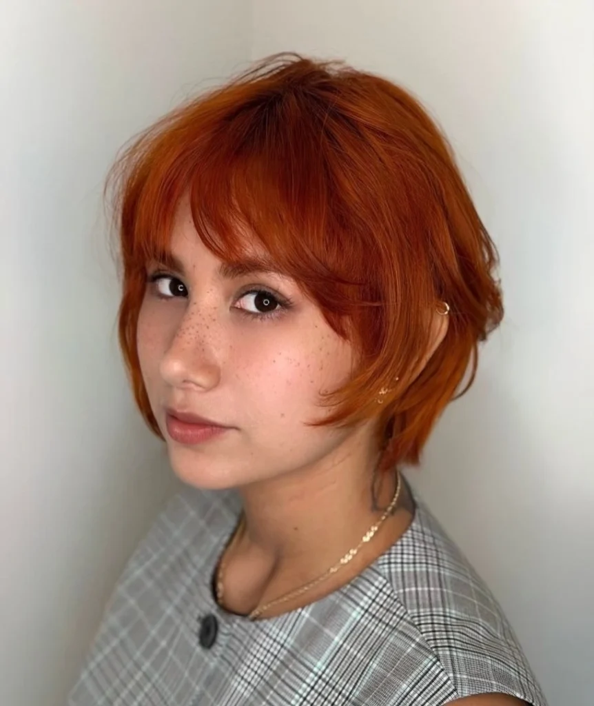 Vibrant Copper Orange Bixie with Wispy Fringe