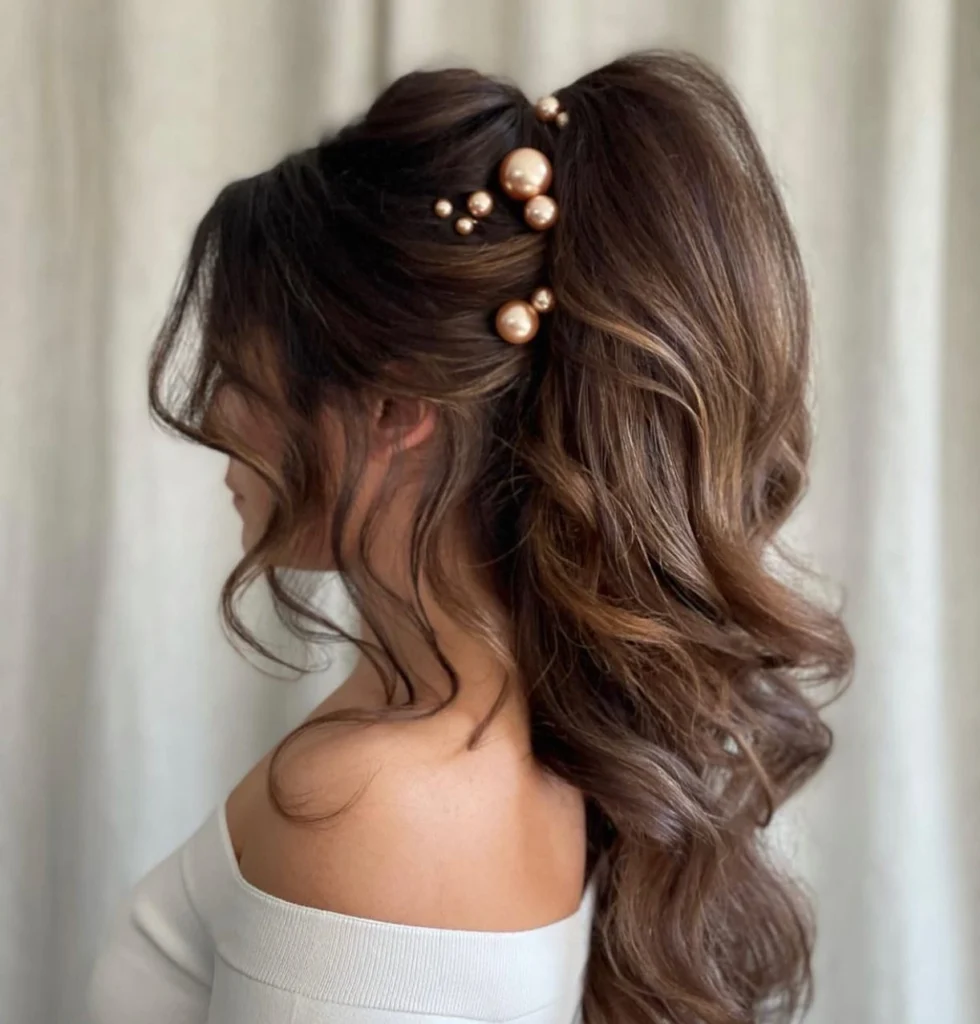 Voluminous High Ponytail with Pearl Pin Details