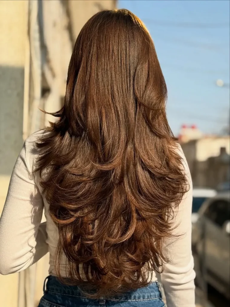 Warm Chestnut Long Layers with Tiered Curled Ends