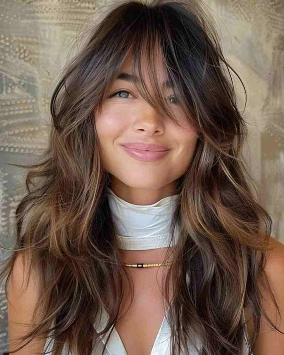 Brunette Balayage Shag With Sweeping Curtain Bangs