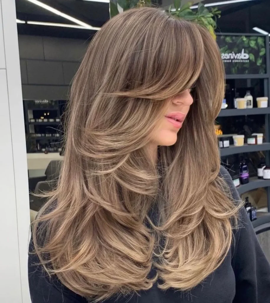 Cool Ash Brown Stacked Layers With Side Swept Curtain Bangs