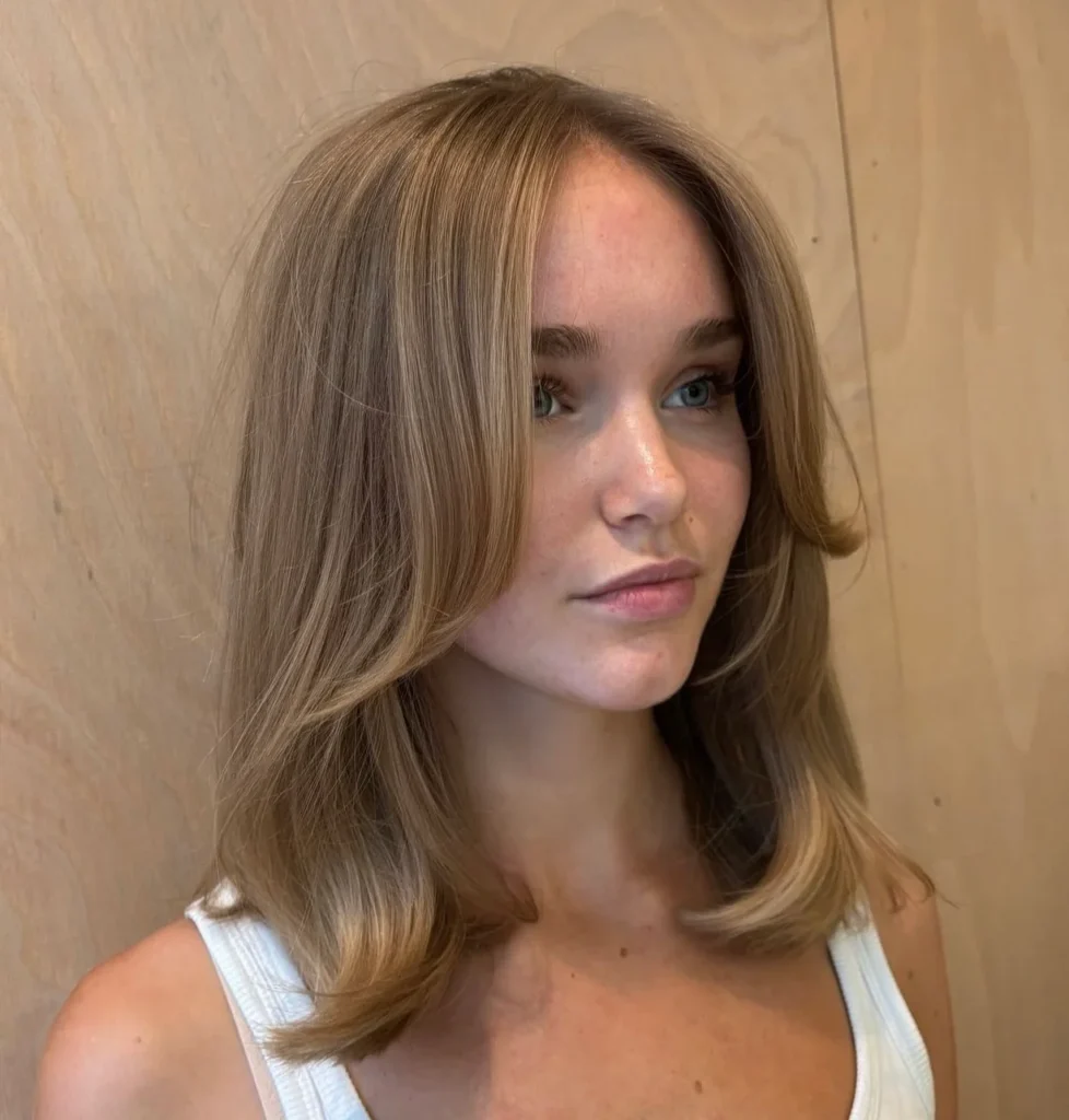 Dark Blonde Sleek Midi With Minimalist Curtain Bangs
