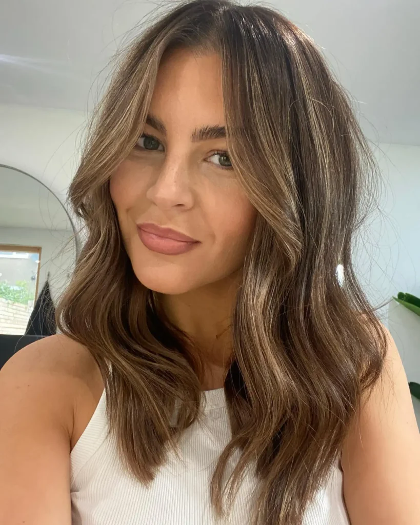 Dimensional Brunette Waves with Curtain Bang Fringe