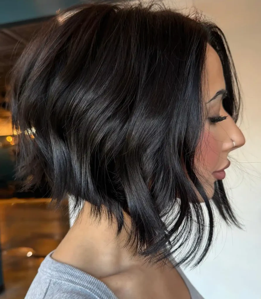 Glossy Dark Bob with Soft Layers and Wispy Disconnected Ends