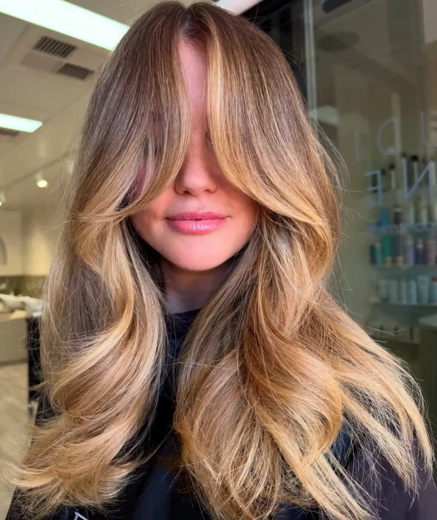 Golden Bronde Face Covering Curtain Bangs With Long Layers