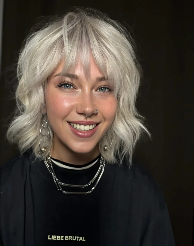 Ice Blonde Shaggy Bob with Curtain Fringe and Wavy Layers