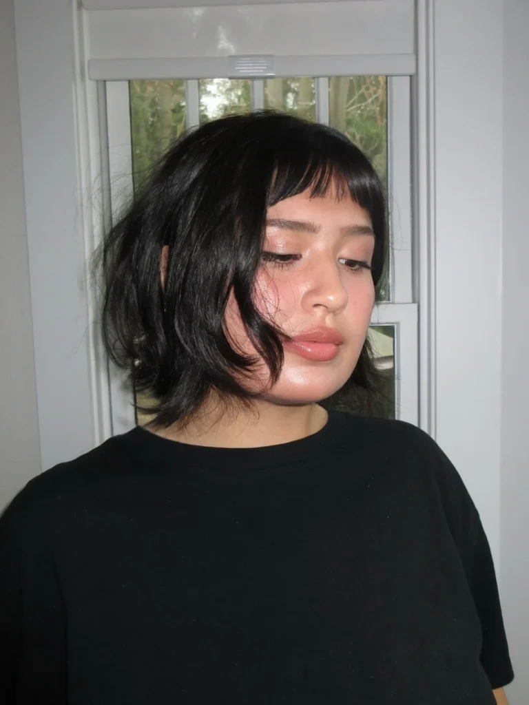 Jet Black Short Bob with Micro Fringe and Loose Natural Waves