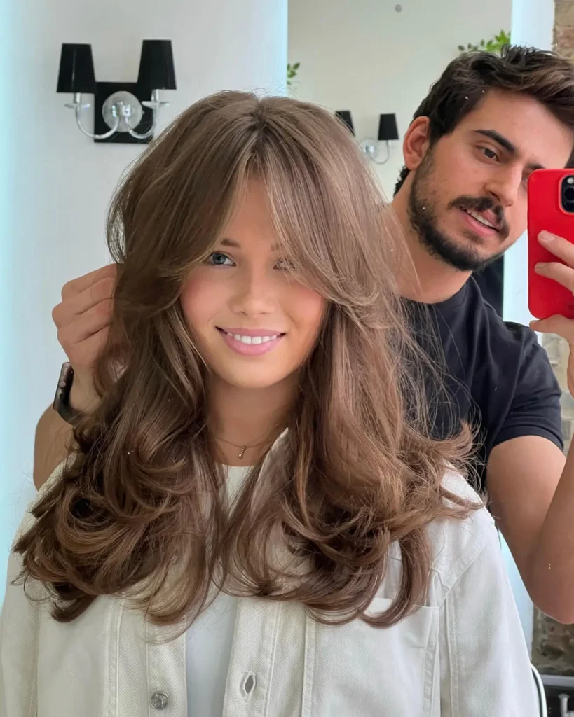 Light Brown Voluminous Blowout With Soft Curtain Bangs