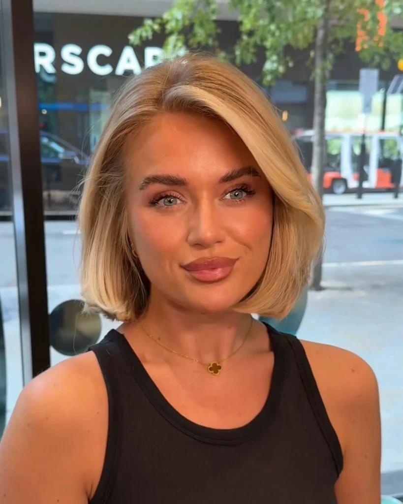  Polished Blonde Bob with Soft Inward Curve and Off-Center Part