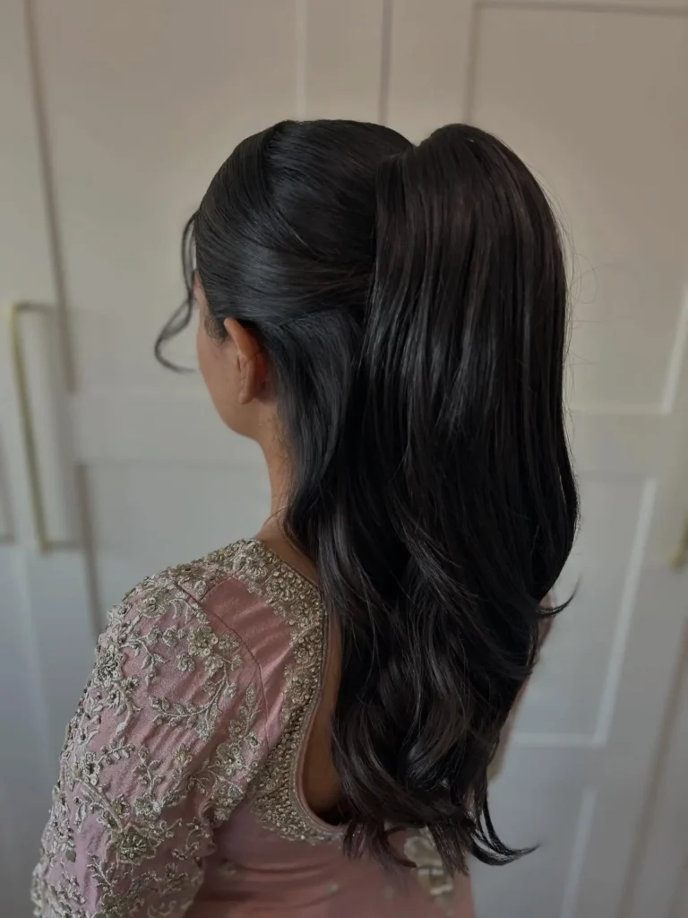 Sleek Black Half Up Ponytail with Soft Flicked Ends