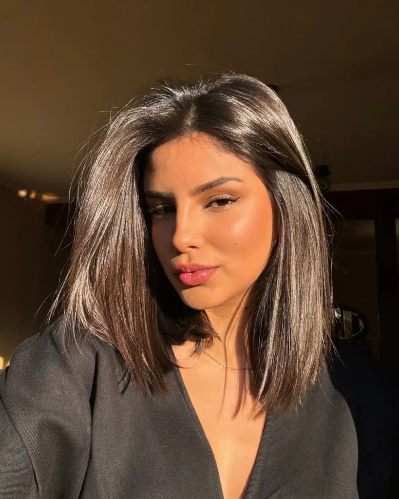 Sleek Dark Lob with Silver Highlight Ribbons