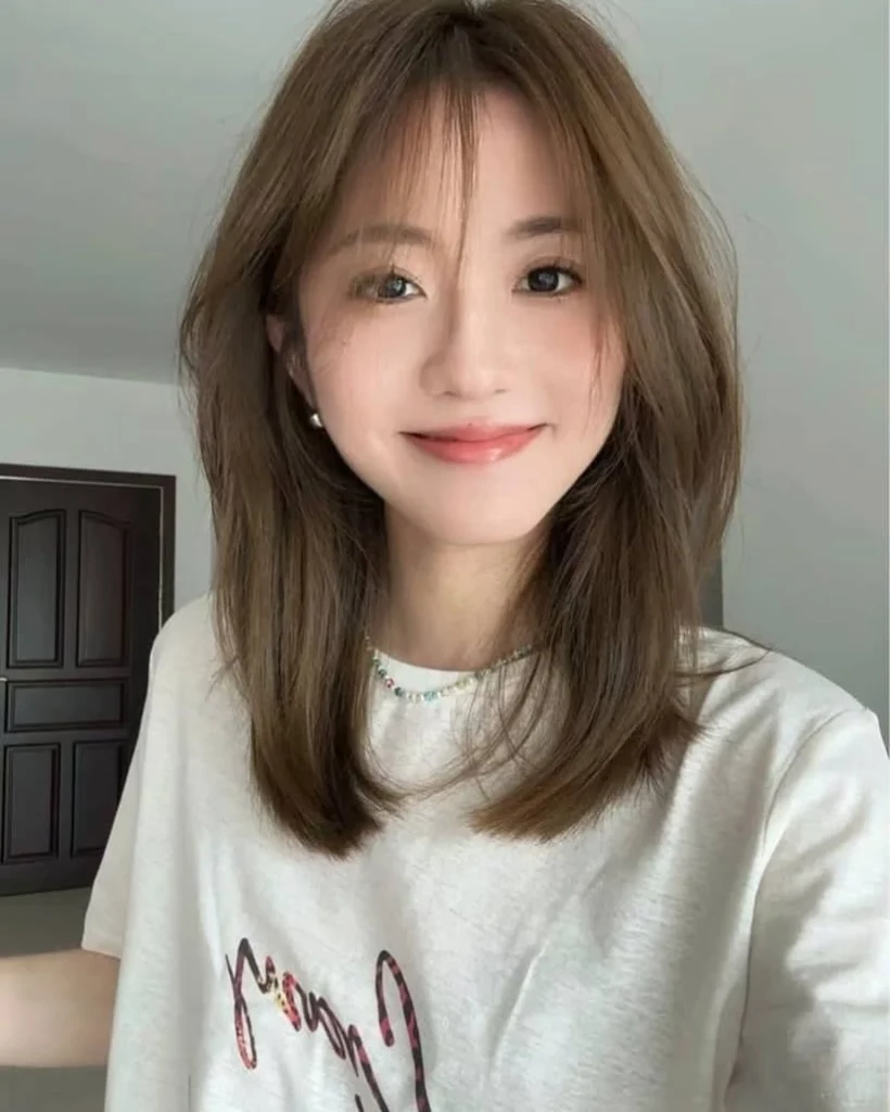 Straight Layered Medium Cut with Wispy Bangs
