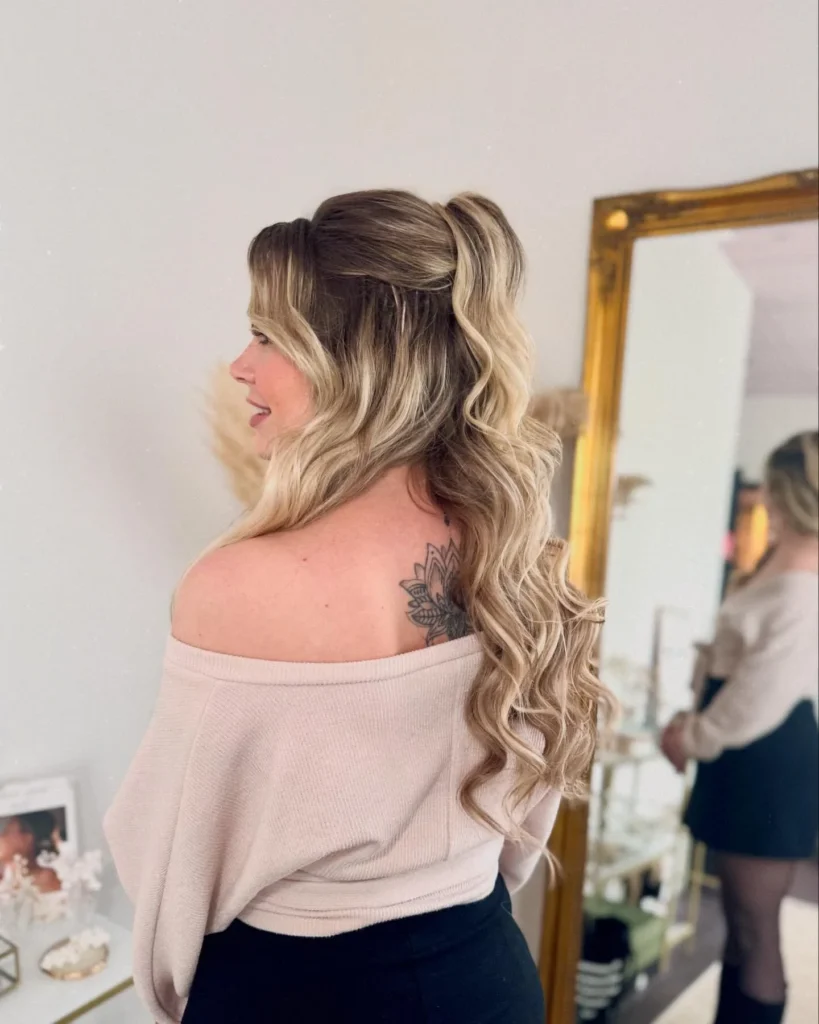 Teased Half Up Ponytail with Curly Blonde Balayage