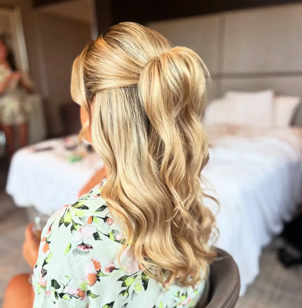 Voluminous Blonde Half Up Ponytail with Curled Ends