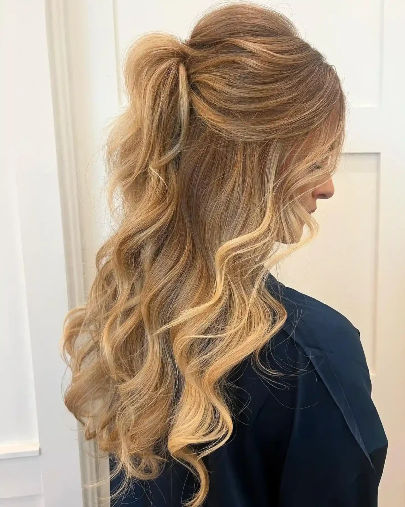 Voluminous Half Up Ponytail with Curls